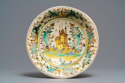 A polychrome Spanish dish with a castle in a landscape, Talavera, 17/18th C.