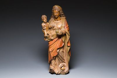 A polychromed carved oak figure of a Madonna and Child, probably France, 16th C.