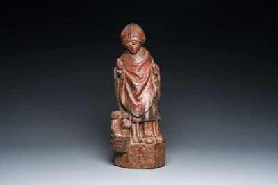 A polychromed wood sculpture of Saint Nicholas with three bathing boys, 15/16th C.