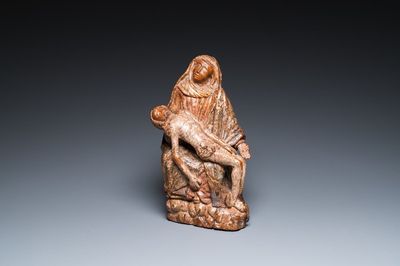 A Portuguese polychromed olive wood Pietà, 16th C.