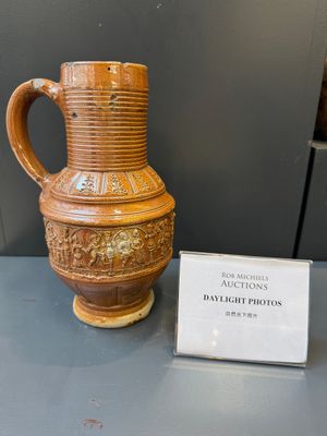 A Raeren stoneware 'peasant dance' jug, late 16th C. — photo 1