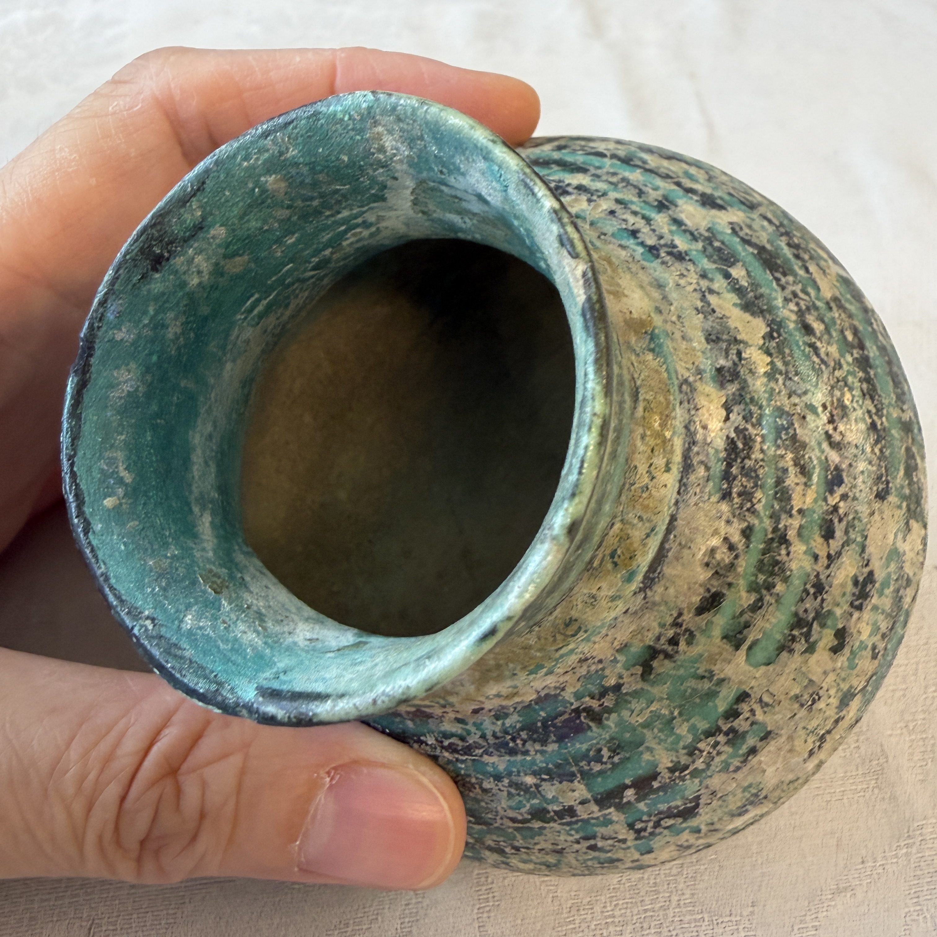 A Raqqa turquoise and black pottery jar with horizontal stripes — photo 8