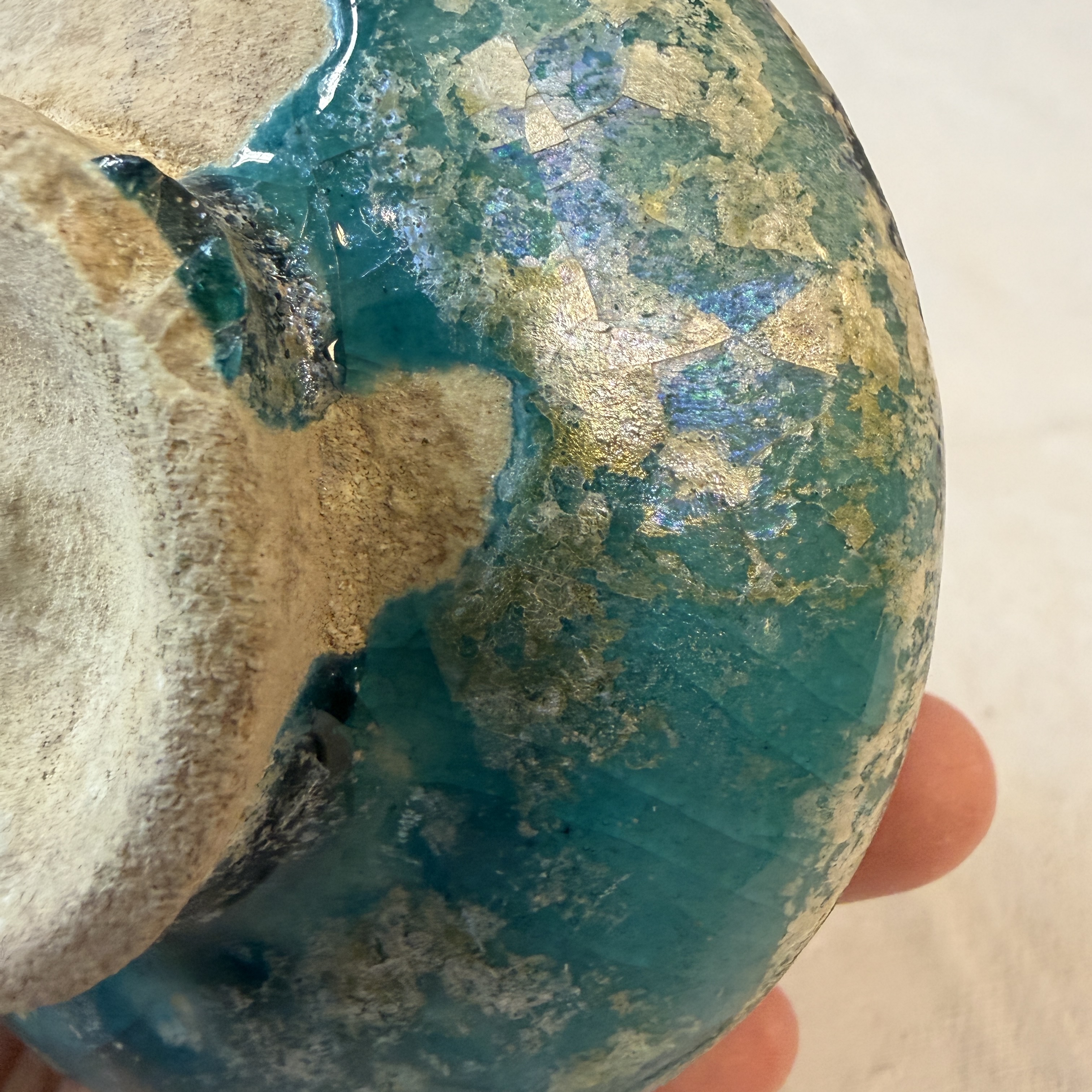 A Raqqa turquoise and black pottery jar with horizontal stripes — photo 12