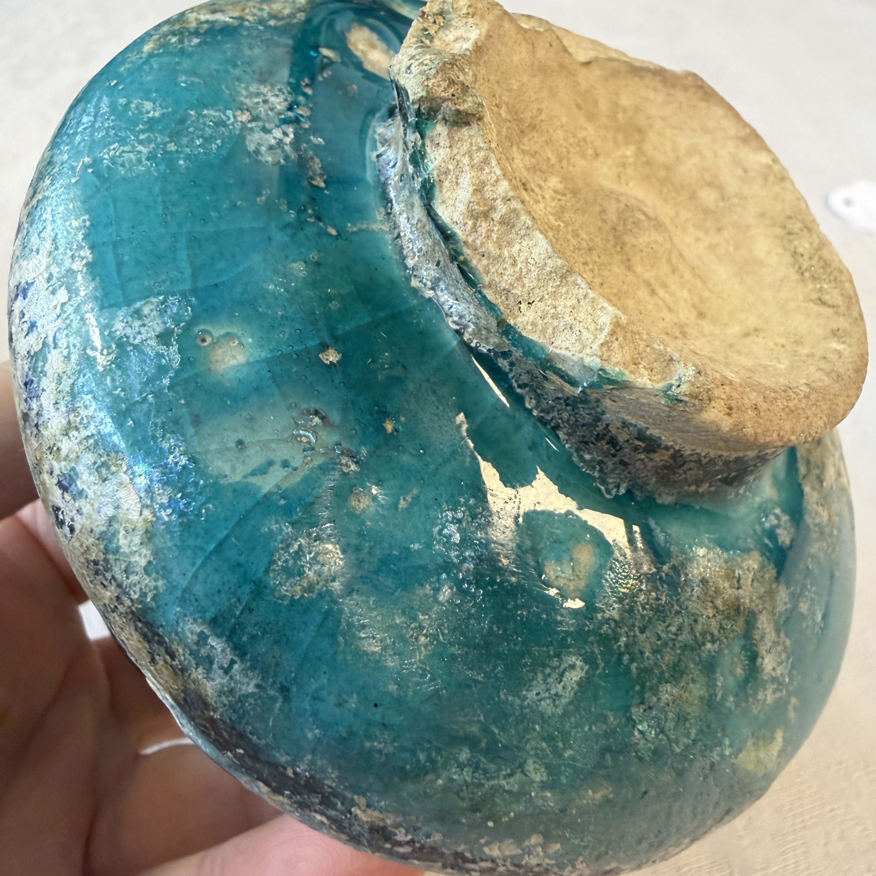 A Raqqa turquoise and black pottery jar with horizontal stripes — photo 13