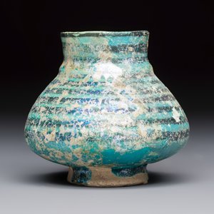 A Raqqa turquoise and black pottery jar with horizontal stripes — photo 2