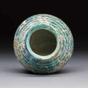 A Raqqa turquoise and black pottery jar with horizontal stripes — photo 6