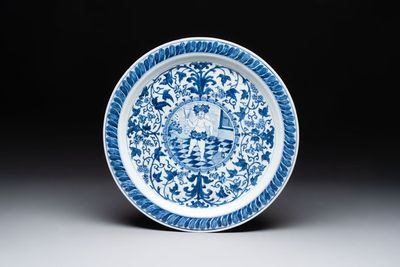 A rare and large Chinese blue and white 'Bacchus' dish, Kangxi
