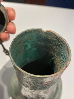 A rare archaic Chinese bronze gourd-shaped vase and cover, 'hu', Eastern Zhou — photo 21