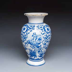 A rare blue and white Brussels faience vase with a cherub trumpeter — photo 1