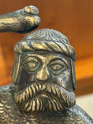 A rare bronze 'wild man' candlestick, Flanders or Germany, 15/16th C. — photo 21