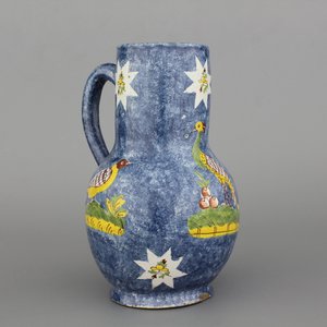 A rare Brussels faience blue ground jug with a peacock, 18th C. — 照片 1