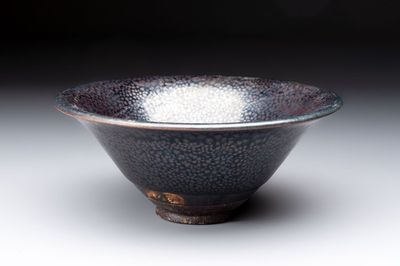 A rare Chinese black-glazed 'oil-spot' tea bowl, Song/Jin