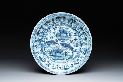 A rare Chinese blue and white 'fish swimming in a lotus pond' dish, Hongzhi/Zhengde