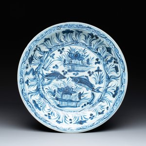 A rare Chinese blue and white 'fish swimming in a lotus pond' dish, Hongzhi/Zhengde — photo 1