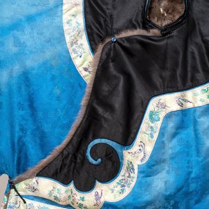 A rare Chinese blue-ground embroidered silk 'butterflies and flowers' robe, lined with fur, 19th C. — photo 3