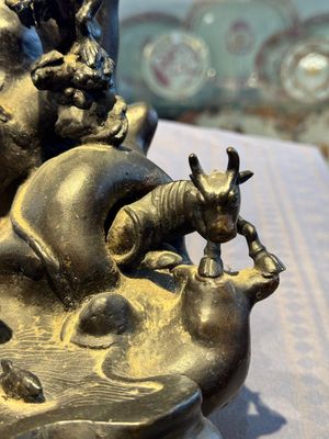 A rare Chinese bronze group depicting two immortals and various animals in a mountainous landscape, Ming — photo 11