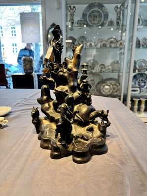 A rare Chinese bronze group depicting two immortals and various animals in a mountainous landscape, Ming — photo 2