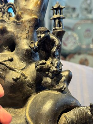 A rare Chinese bronze group depicting two immortals and various animals in a mountainous landscape, Ming — photo 9