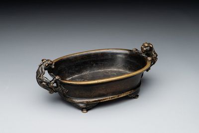 A rare Chinese bronze narcissus basin-shaped censer with dragon handles, Xuande mark, 17th C.