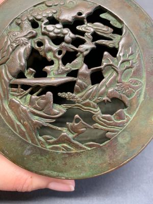 A rare Chinese bronze 'sage in a mountainous landscape' handwarmer, 17/18th C. — photo 6