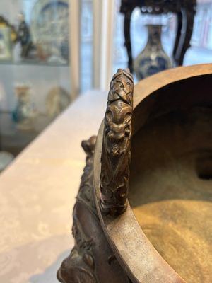 A rare Chinese bronze tripod censer with relief mythical animal and grape design, Xuande mark, 19th C. — photo 23