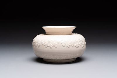 A rare Chinese Dehua blanc de Chine vase with floral design, Kangxi