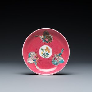 A rare Chinese famille rose ruby-ground 'three butterflies' saucer, Yongzheng — photo 1