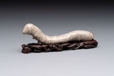 A rare Chinese ge-type model of a silkworm on wooden stand, 18th C.