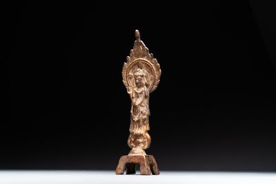 A rare Chinese gilt bronze standing Buddha with aureola and inscription, Northern Wei, dated 441