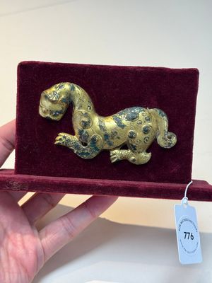 A rare Chinese gilt-bronze 'tiger' ornament, Han — photo 1