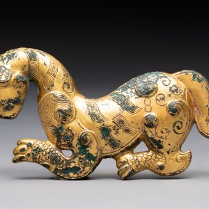 A rare Chinese gilt-bronze 'tiger' ornament, Han — photo 3