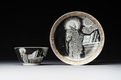 A rare Chinese grisaille and gilt cup and saucer with Ignatius of Loyola, Qianlong