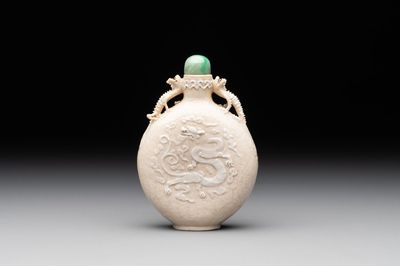 A rare Chinese monochrome ge-type 'chilong' snuff bottle with jadeite stopper, Qianlong mark and of the period