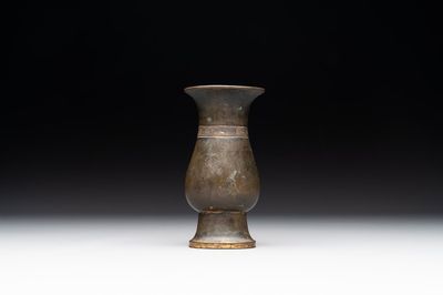 A rare Chinese parcel-gilt bronze ritual wine vessel, 'zhi 觯', Ming