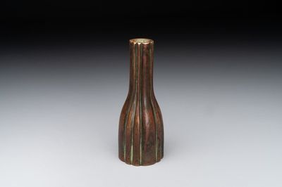 A rare Chinese ribbed bronze flower arranging vase, Ming