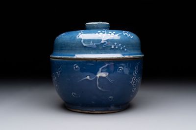 A rare Chinese Swatow white slip-decorated blue-ground bowl and cover, Ming