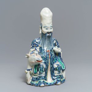 A rare Chinese wucai figure of Shoulao seated on a deer, Wanli — photo 1