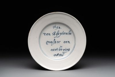 A rare Dutch Delft blue and white 'earthquake' plate, dated 1692