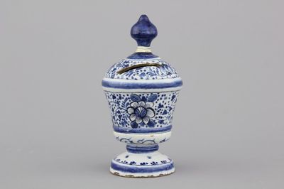 A rare Dutch Delft blue and white money bank, 18th C.