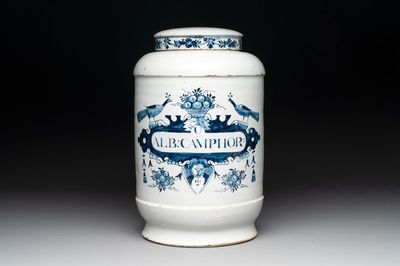 A rare large blue and white Dutch Delft albarello with original cover, 18th C.