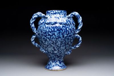 A rare large Nevers white-splashed blue-ground rope twist handled vase with 'à la bougie' decor, France, 17th C.