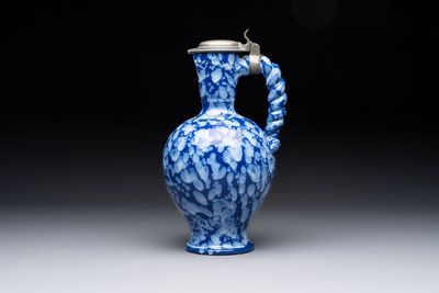 A rare Nevers pewter-mounted white-splashed blue-ground 'à la bougie' ewer with rope twist handle, France, late 17th C.