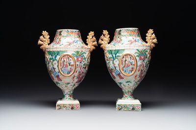 A rare pair of Chinese Canton famille rose export urns, 19th C.