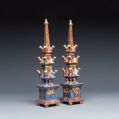 A rare pair of European-decorated Chinese blue and white pyramidal tulip vases, Kangxi