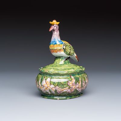 A rare polychrome Dutch Delft butter tub with a crowned bird, 18th C.