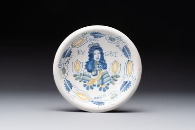 A rare polychrome Dutch Delft 'King William' dish, inscribed 'KV GBT', 17th C.