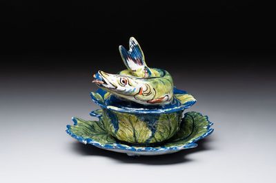 A rare polychrome Dutch Delft pike tureen and cover on stand, 18th C.