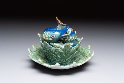 A rare polychrome Dutch Delft pike tureen and cover on stand, 18th C.