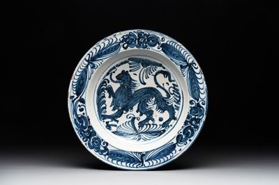 A rare Spanish blue and white pottery 'lion' dish from the 'mariposas' series, Puente del Arzobispo, Toledo, 16th C.
