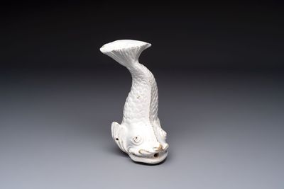 A rare white-glazed Delftware dolphin-shaped fountain, 18th C.